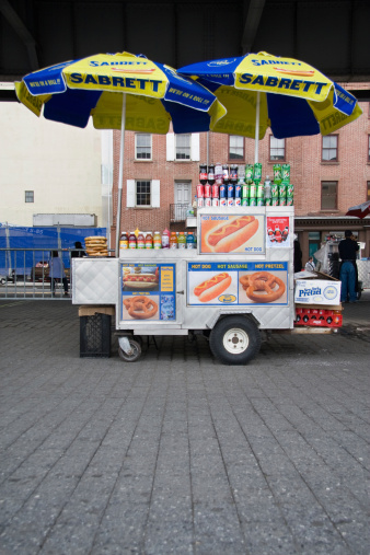 New York City, USA - May 24, 2011: Sabrett Hot dog stand at South Street Seaport in Manhattan, under the FDR East River Drive.