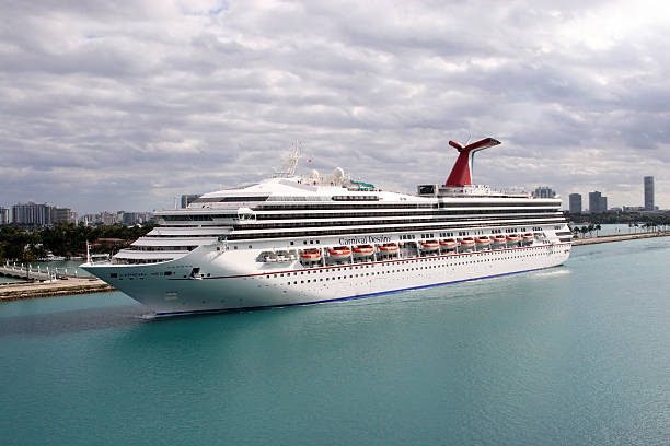Destiny of Carnival Cruise Lines Miami, USA - February 08, 2009: Carnival Destiny of Carnival Cruise Lines entering to the Port of Miami. Port of Miami is one of the busiest cruise ports in the world. carnival sunshine stock pictures, royalty-free photos & images