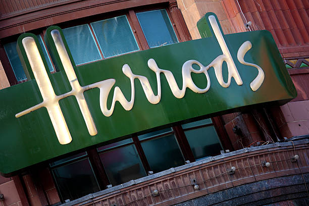 Harrods Department Store, Knightsbridge, London London, United Kingdom - September 23, 2011: Illuminated sign on the outside wall of the famous Harrods Department Store, Knightsbridge, London. harrods photos stock pictures, royalty-free photos & images