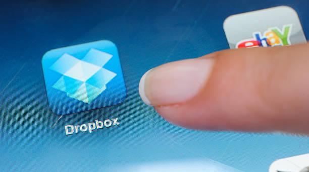 dropbox приложений на ipad - apple com стоковые фото и изображения