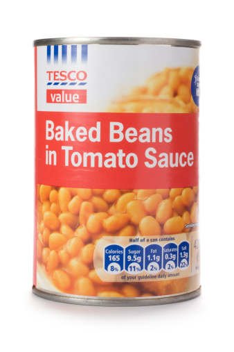 St Ives, England - October 20, 2011: A tin of Tesco Value baked beans isolated on a white background.