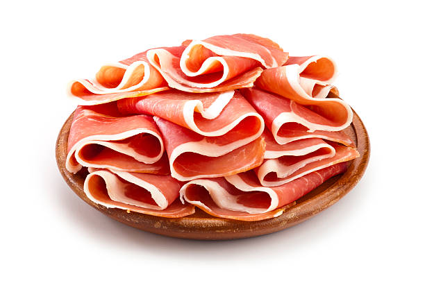 ham Prosciutto Slices on White Background prosciutto stock pictures, royalty-free photos & images