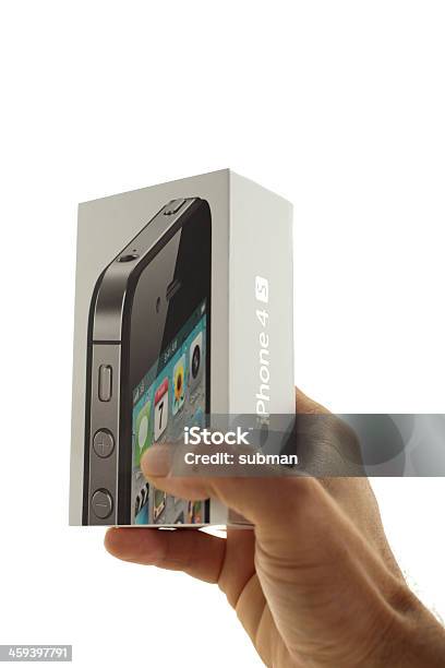 Hand Holding The Iphone 4s Packaging Box Stock Photo - Download Image Now - Apple Computers, Big Tech, Cloud Computing