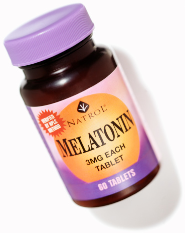 Truro, MA USA - October 21, 2011: A bottle of Melatonin antioxidant 2 mg tablets manufactured by Natrol. Natrol is headquartered in Chatsworth, California, USA.