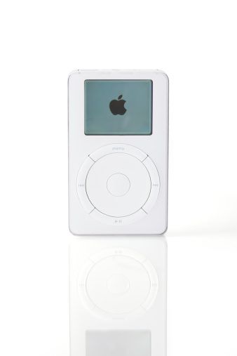 Notre-Dame-De-Lile-Perrot, Canada, October 6, 2011. First Generation iPod (Scroll wheel) with Apple logo on screen, from Apple Inc. USA. Introduced by Apple in October 2001.