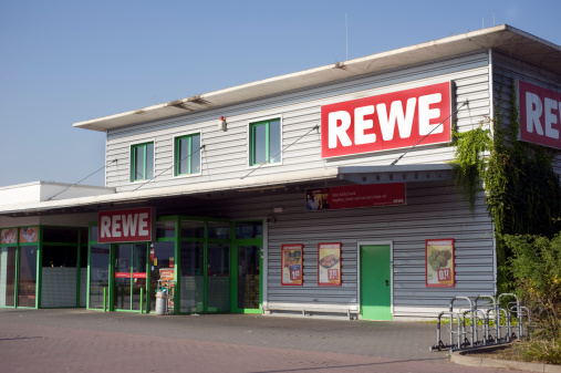 Gross-Umstadt, Germany - October 3, 2011: REWE Market is a german discount chain. The operate about 3000 stores in Germany. Owner of REWE Market is the REWE Group. The REWE group is the second biggest food trader in Germany. They are headquartered in Koeln.