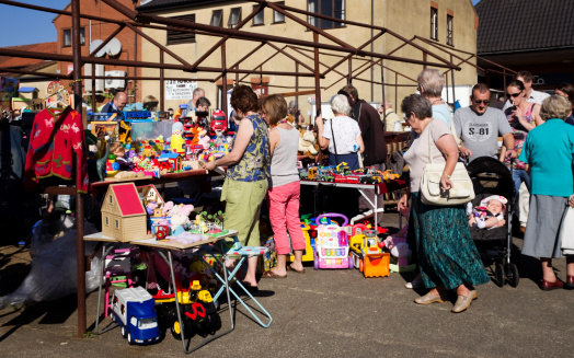 Montevideo, Uruguay - December 22, 2022: Visitors viewing the eclectic offerings on display at a flea market in the old town of Montevideo, capital of Uruguay