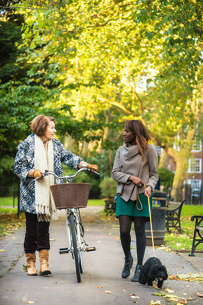 istock Two women in park 459402379