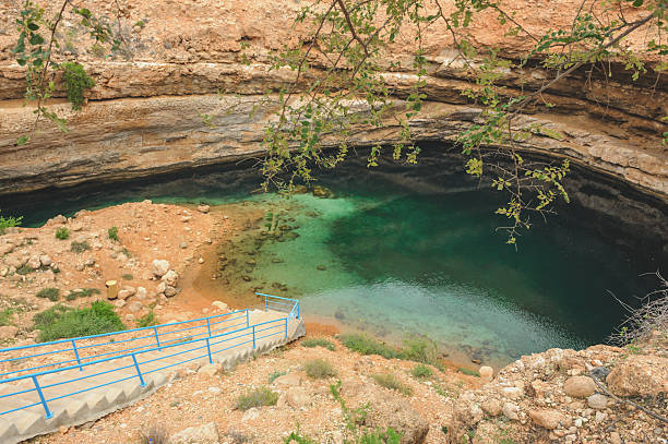 карст - natural phenomenon hawiyat najm park cliff cave стоковые фото и изображения