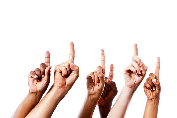 istock Up there, look! Many hands point upwards on white 459404457