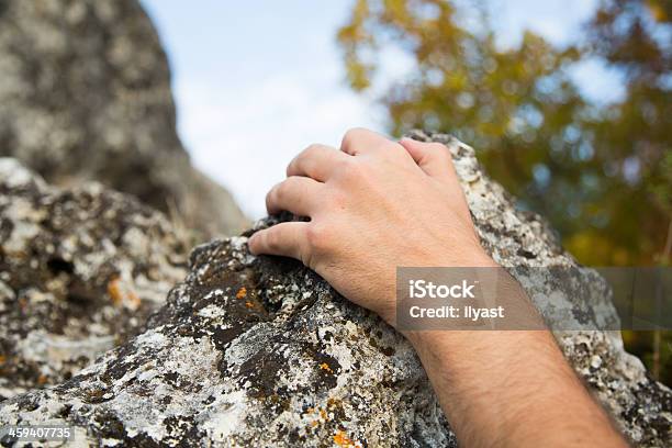 Climber Holding Rock Stock Photo - Download Image Now - Activity, Adult, Adults Only