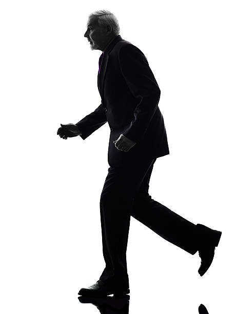 istock senior business man running silhouette 459407915
