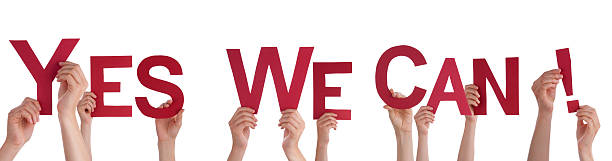 istock People Holding Yes We Can 459413553
