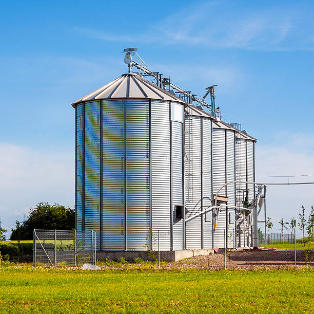 istock beautiful silver silos in landscape 459416671