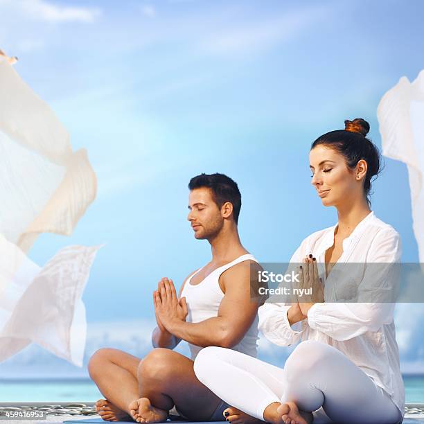 Yoga Meditation Outdoors Stock Photo - Download Image Now - Breathing Exercise, Traditional Ceremony, 20-29 Years