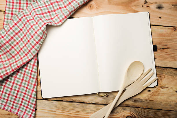 istock Blank recipe book on wooden table 459427027