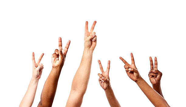 istock Six hands make Peace or V for Victory signal 459430485