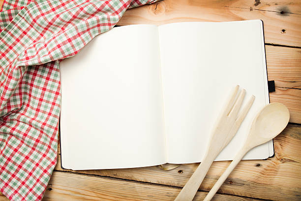 istock Blank recipe book on wooden table 459434235