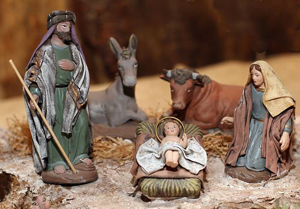 istock Nativity scene with Jesus, Joseph and Mary in a manger 459434915