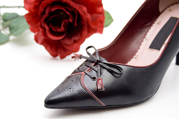 istock Black ladies shoes with rose 459435875