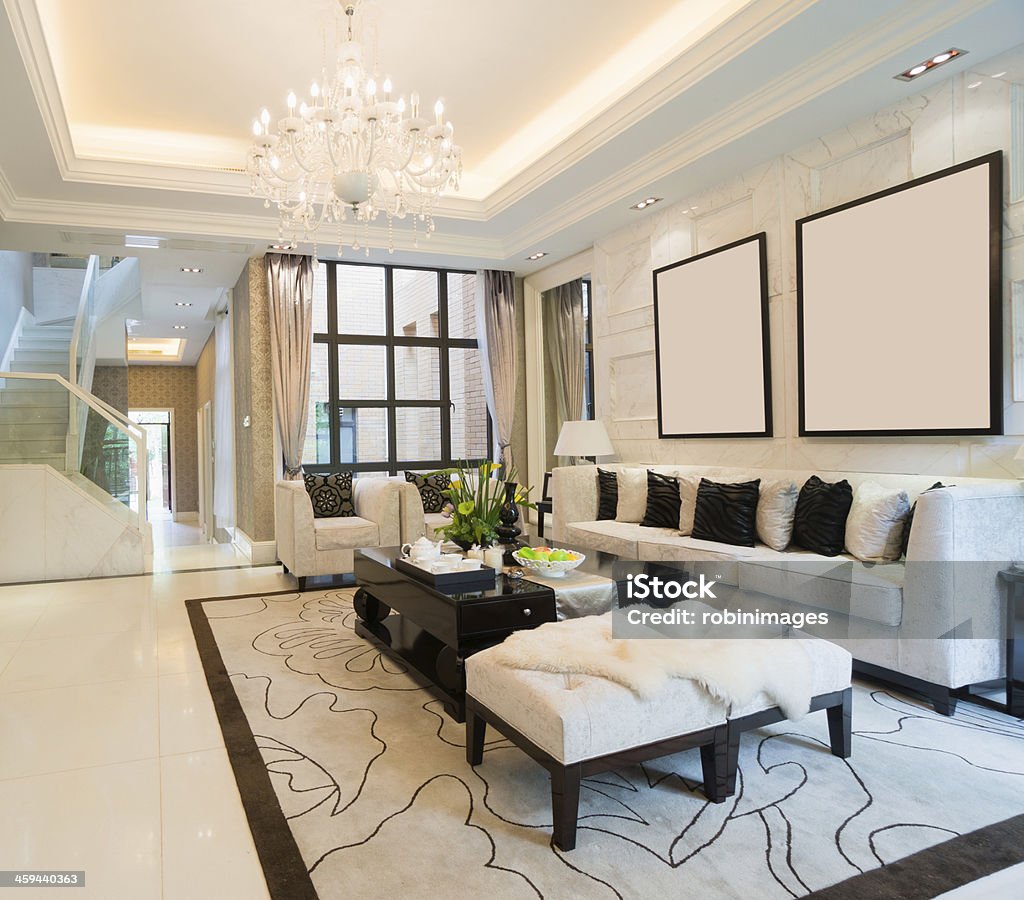 Modern decorated room with a white theme and chandelier luxury living room with nice decoration Carpet - Decor Stock Photo