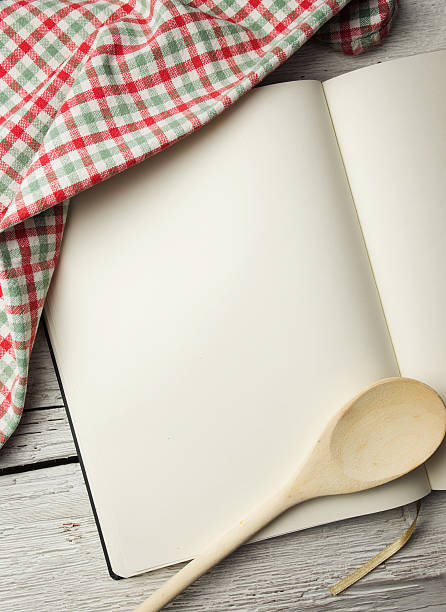 istock Blank recipe book on wooden table 459440543