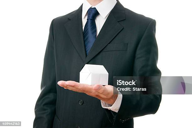 Paper House In The Hand Of A Businessman Stock Photo - Download Image Now - Adult, Adults Only, Agreement