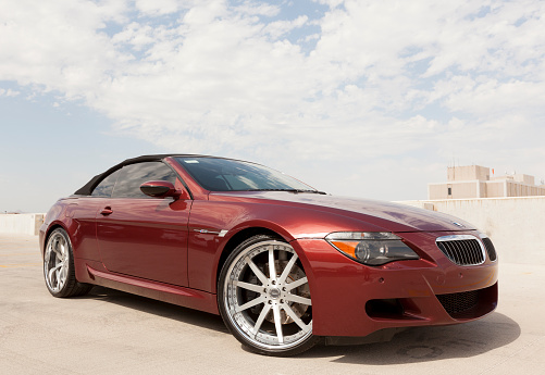 Scottsdale, United States - June 28, 2011: A parked maroon BMW M6 coupe. The 6 series from BMW is their top level series of cars.
