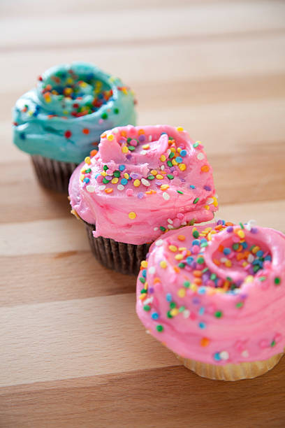 istock Cupcakes with frosting and sprinkles 459444749