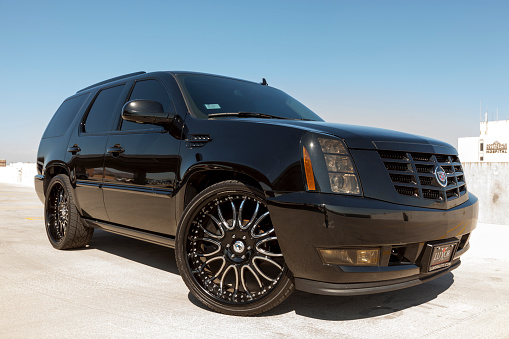 Scottsdale, United States - September 28, 2011: A photo of a black parked  Cadillac Escalade, the Escalade from Cadillac is their most popular SUV.