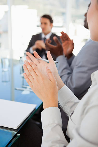istock Focus shot of  hands clapping with someone in the background 459446439