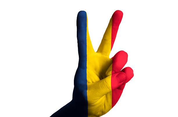 istock romania national flag two finger up gesture for victory 459451831