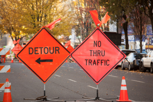 Detour and No Thru Traffic signs in downtown Portland Oregon