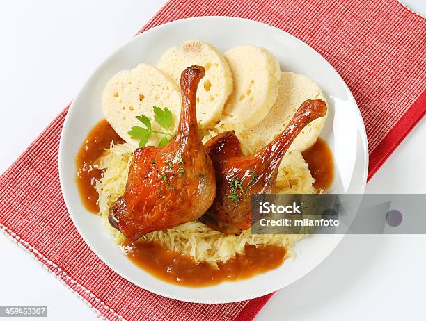 Roasted Duck Dumplings And Cabbage Stock Photo - Download Image Now - Animal Body Part, Animal Bone, Animal Leg