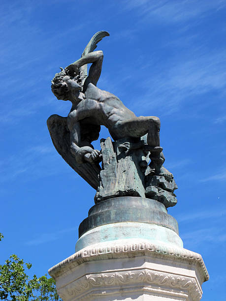 istock foreground of the fallen angel statue in Madrid Spain 459463821