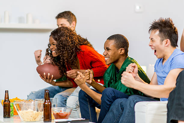 istock Young adults watching football 459465685