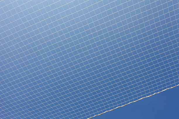 safety net safety net against clear blue sky, looking up safety net stock pictures, royalty-free photos & images