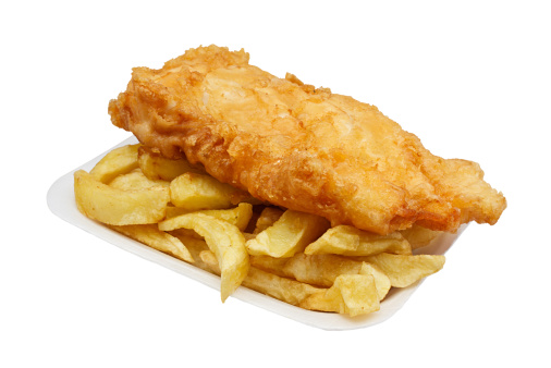 Carton of fish and chips. A traditional British takeaway choice isolated on white