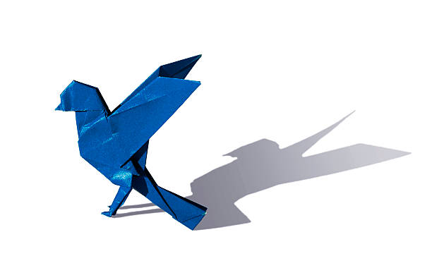 istock Blue Origami bird robin isoated on white 459493243