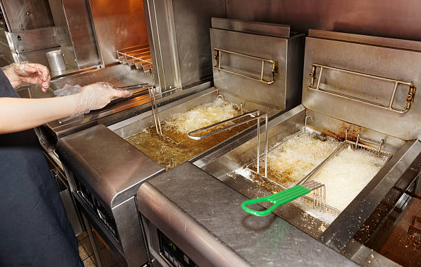 istock Deep fryer with boiling oil 459503143