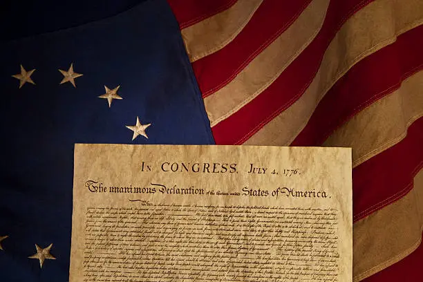 Photo of USA Declaration of Independence Replica on Grungy Betsy Ross Flag