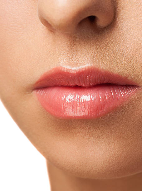 istock Woman lips with pink  lipstick 459507005