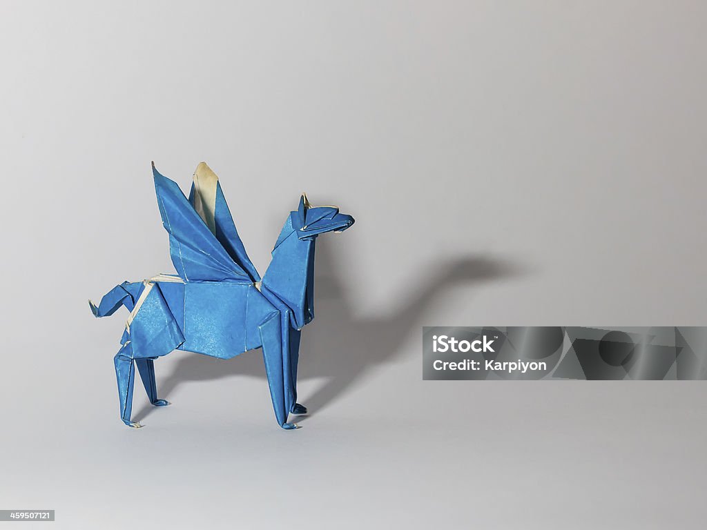 Origami blue Pegasus isolated on white Origami gold Pegasus Animal Stock Photo