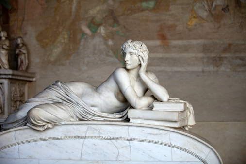 Pisa Campo Santo: Detail from Tomb of Ottaviano Fabrizio Mossotti (1791 - 1863), italian mathematician, physicist and astronomer. The reclining figure represents the Science.  Gentle beauty immortalised in marble