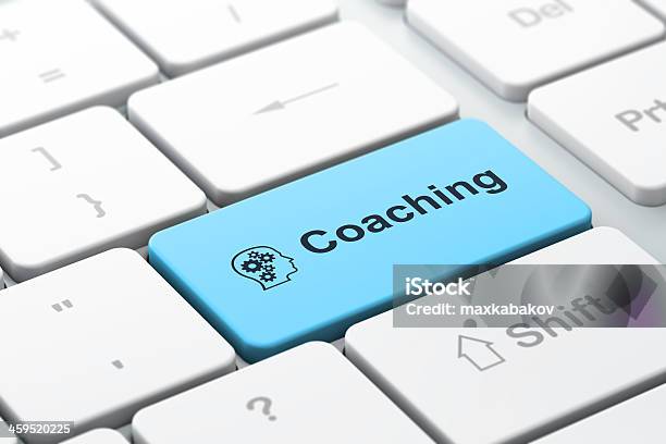 Education Concept Head With Gears And Coaching On Computer Keyb Stock Photo - Download Image Now