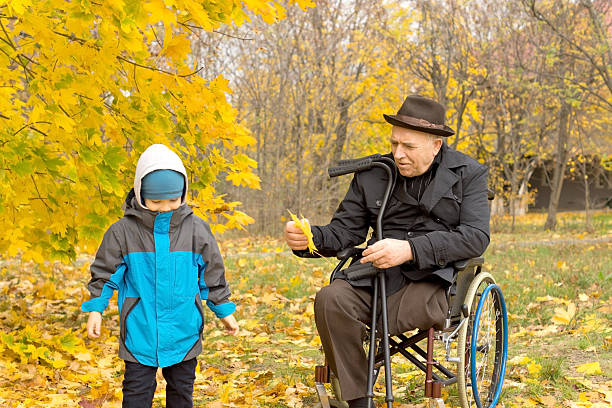 istock Disabled grandfather playing with his grandson 459521835