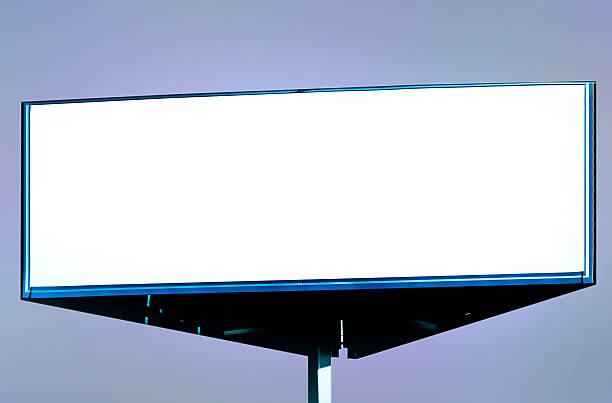istock Wide white background of illuminated big blank billboard 459522047