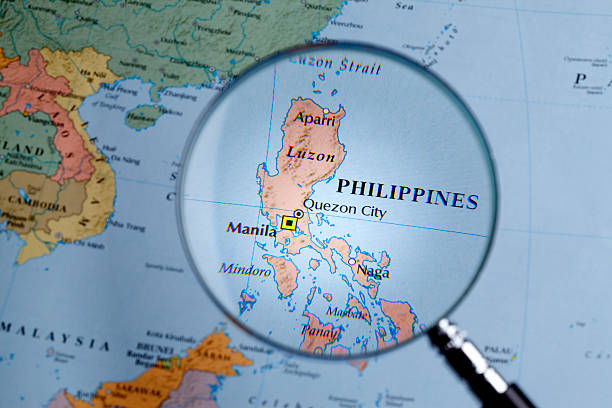 istock Magnifying glass over a map of Philippines 459527129
