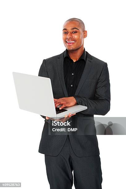 Foto de Bonito Jovem Empresário Com Um Laptop e mais fotos de stock de Fundo Branco - Fundo Branco, Homens, Afro-americano