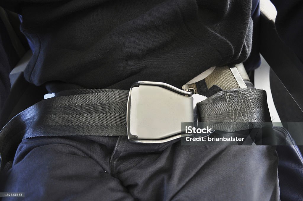 Cinturón de seguridad en el avión - Foto de stock de Cinturón de seguridad libre de derechos